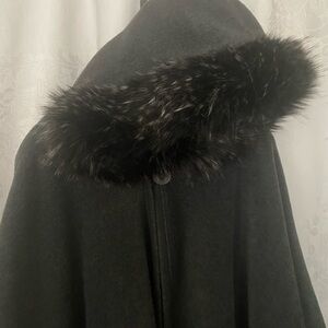 Cozy cape. Plush, soft fleece with faux fur edging on hood.
